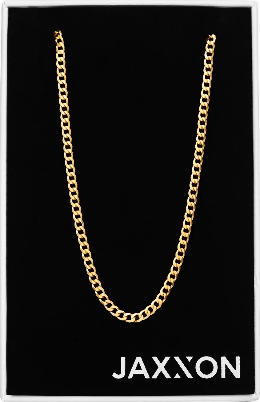 A JAXXON gold Cuban link chain in its black box, on white marble